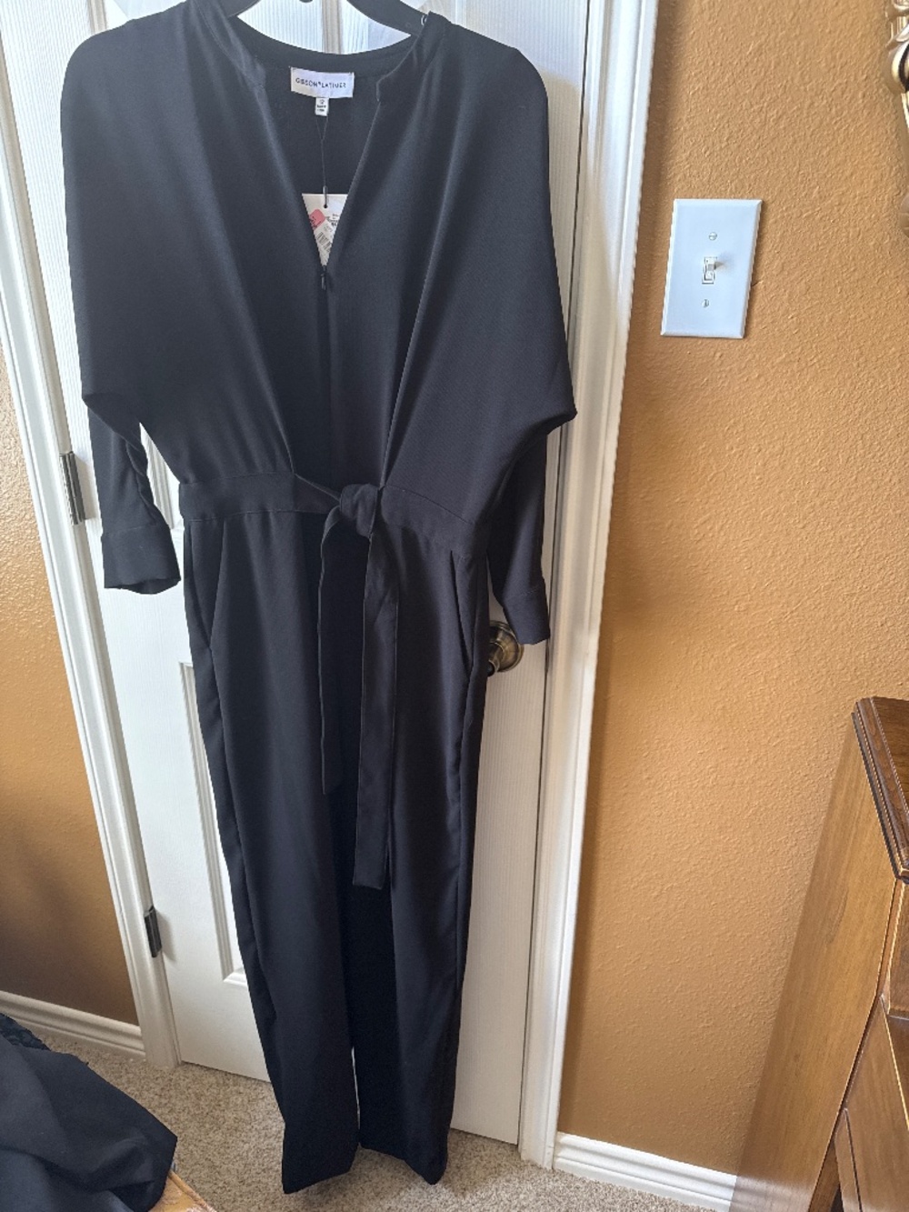 Black jumpsuit.